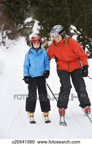 Mother and daughter skiing together View Large Photo Image Stock Image - Mother and daughter skiing together. Fotosearch