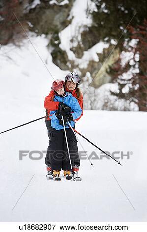 Mother and daughter skiing together View Large Photo Image Stock Photo - Mother and daughter skiing together. Fotosearch