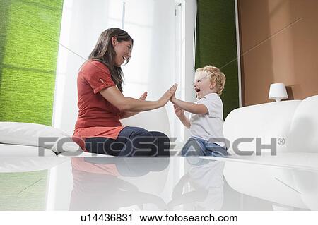 Mother and son having fun View Large Photo Image Stock Image - Mother and son having fun. Fotosearch