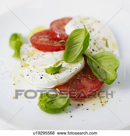 Stock Photo - Mozzarella and tomatoes. Fotosearch