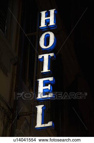 Neon Hotel sign at night View Large Photo Image Picture - Neon Hotel sign at night. Fotosearch