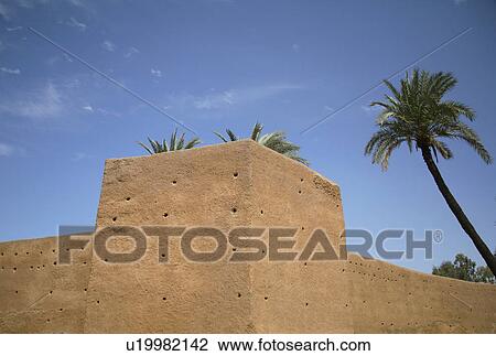 Old city walls and palm trees View Large Photo Image Stock Image - Old city walls and palm trees. Fotosearch