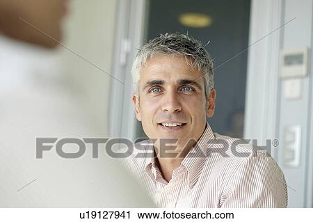 Older business man in meeting View Large Photo Image Stock Image - Older business man in meeting. Fotosearch