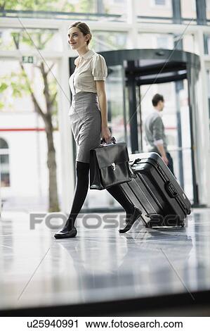 People at an airport View Large Photo Image Stock Image - People at an airport. Fotosearch