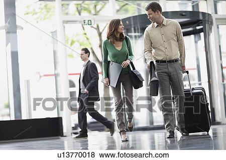 People at an airport View Large Photo Image Stock Photo - People at an airport. Fotosearch