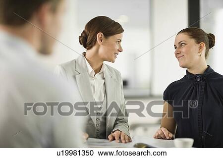 People in an office View Large Photo Image Stock Image - People in an office. Fotosearch