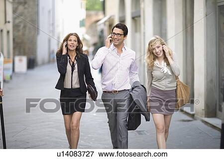 Stock Photo - People on the phone. Fotosearch