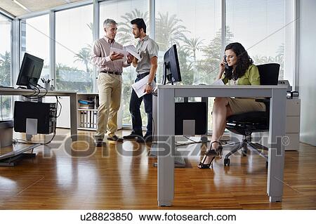 People working in modern office View Large Photo Image Stock Image - People working in modern office. Fotosearch