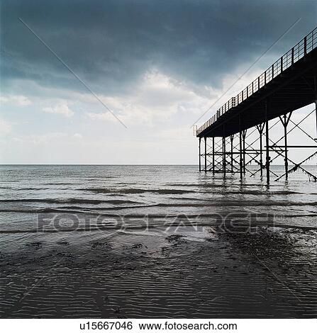 Pier in the sea View Large Photo Image Stock Photograph - Pier in the sea. Fotosearch
