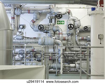 Picture - Pipework in ship's engine room. Fotosearch
