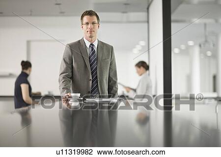Stock Image - Portrait of a business man. Fotosearch