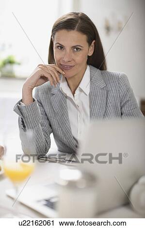 Stock Image - Portrait of a business woman. Fotosearch