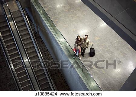 Picture - Portrait of a family at airport. Fotosearch