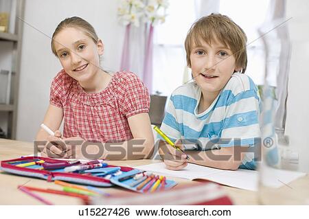 Portrait of a girl and a boy View Large Photo Image Stock Photograph - Portrait of a girl and a boy. Fotosearch