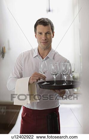 Portrait of a waiter View Large Photo Image Stock Image - Portrait of a waiter. Fotosearch