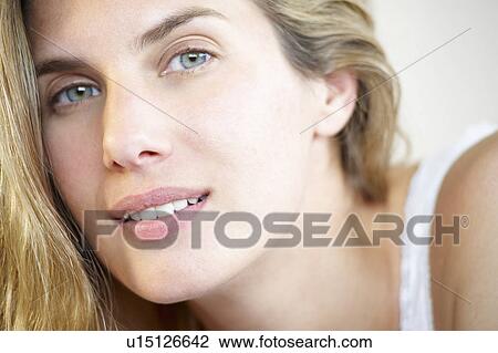Portrait of a woman, looking at camera View Large Photo Image Stock Image - Portrait of a woman, looking at camera. Fotosearch