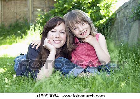 Picture - Portrait of happy mother and child. Fotosearch
