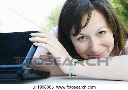 Portrait of happy woman finishes work View Large Photo Image Stock Photography - Portrait of happy woman finishes work. Fotosearch