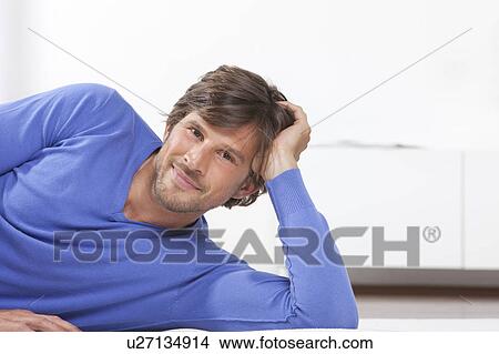 Portrait of man on rug View Large Photo Image Picture - Portrait of man on rug. Fotosearch