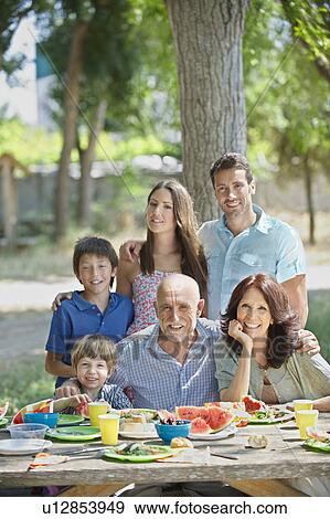 Portrait of multi-generational family View Large Photo Image Stock Photo - Portrait of multi-generational family. Fotosearch