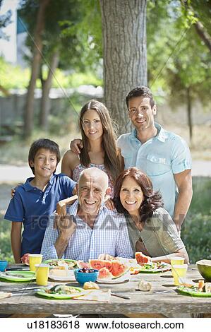 Portrait of multi-generational family View Large Photo Image Stock Photo - Portrait of multi-generational family. Fotosearch