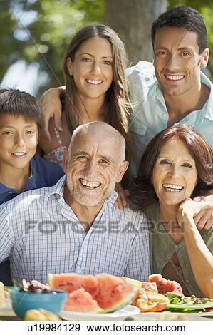 Portrait of multi-generational family View Large Photo Image Stock Photo - Portrait of multi-generational family. Fotosearch