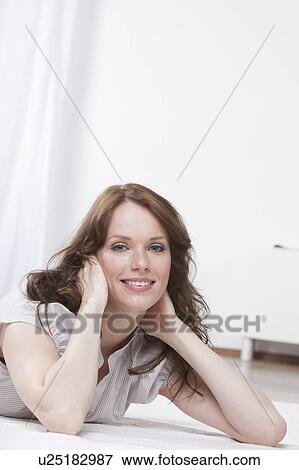 Portrait of woman on rug View Large Photo Image Stock Photo - Portrait of woman on rug. Fotosearch