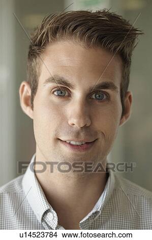 Portrait of young business man View Large Photo Image Picture - Portrait of young business man. Fotosearch