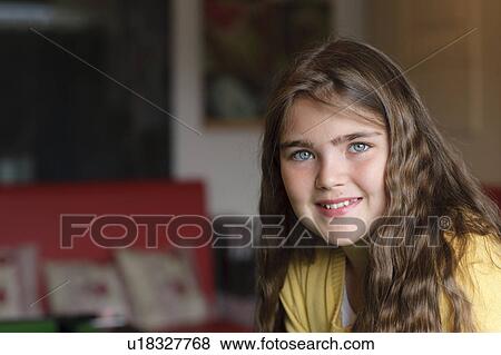 Portrait of young girl in waiting room View Large Photo Image Stock Photo - Portrait of young girl in waiting room. Fotosearch
