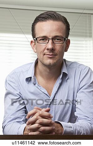 Potrait of man at home View Large Photo Image Stock Image - Potrait of man at home. Fotosearch