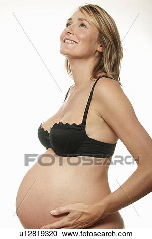 Pregnant woman, smiling View Large Photo Image Stock Image - Pregnant woman, smiling. Fotosearch