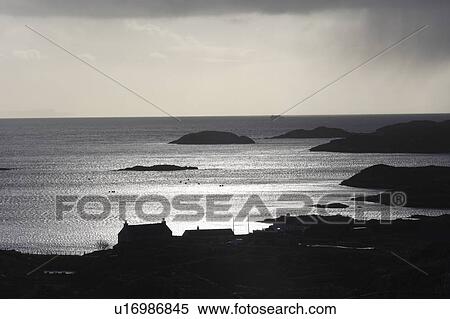 Rain over coastal village View Large Photo Image Stock Photography - Rain over coastal village. Fotosearch