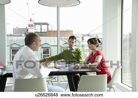 Stock Photo - Relaxed business meeting. Fotosearch