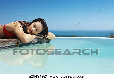 Relaxing in Infinity pool View Large Photo Image Stock Image - Relaxing in Infinity pool. Fotosearch