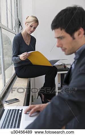 Reviewing a business plan together View Large Photo Image Stock Photo - Reviewing a business plan together. Fotosearch