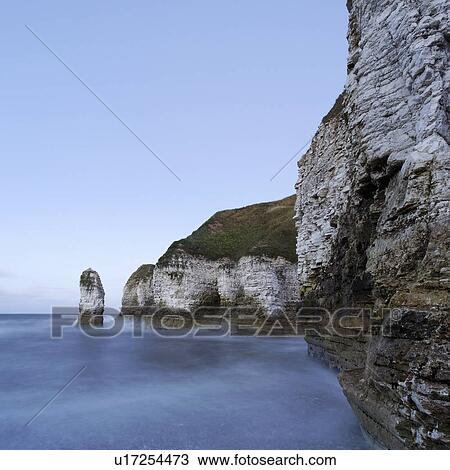 Rocky cliffs by sea View Large Photo Image Stock Image - Rocky cliffs by sea. Fotosearch