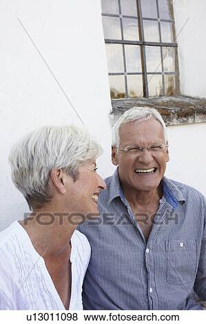 Senior couple laughing View Large Photo Image Stock Photo - Senior couple laughing. Fotosearch