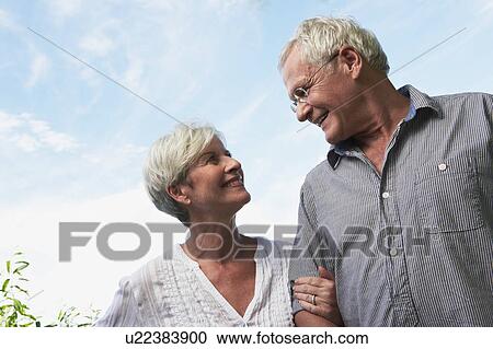 Senior couple walking close-up View Large Photo Image Stock Image - Senior couple walking close-up. Fotosearch