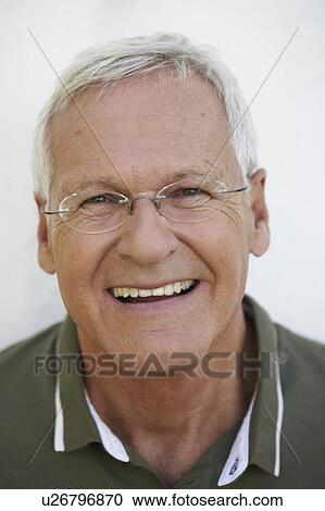 Stock Image - Senior man looking to camera. Fotosearch