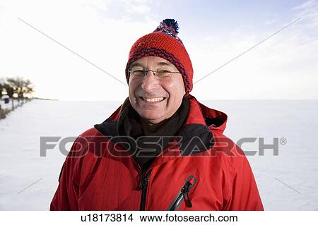 Senior man smiling in the snow View Large Photo Image Picture - Senior man smiling in the snow. Fotosearch