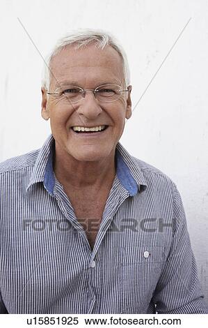 Senior man smiling to camera View Large Photo Image Stock Photography - Senior man smiling to camera. Fotosearch