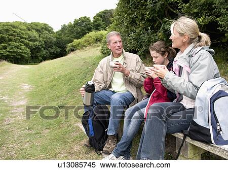 Seniors and grandchild take a break View Large Photo Image Stock Photography - Seniors and grandchild take a break. Fotosearch