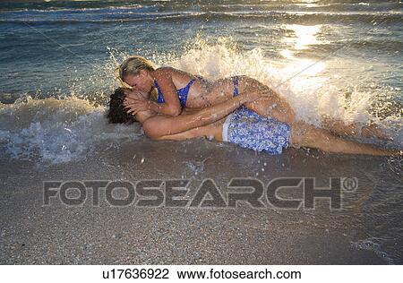 Sexy cple kiss in tide beach View Large Photo Image Stock Image - Sexy cple kiss in tide beach. Fotosearch