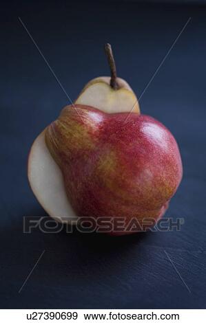 Split red pear View Large Photo Image Stock Photo - Split red pear. Fotosearch