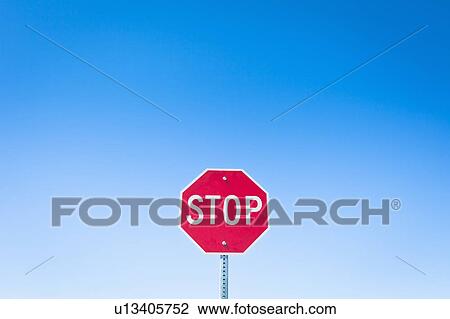 Stop sign against blue sky View Large Photo Image Stock Image - Stop sign against blue sky. Fotosearch