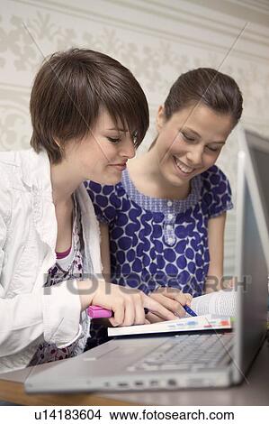 Students studying in a cafe View Large Photo Image Picture - Students studying in a cafe. Fotosearch