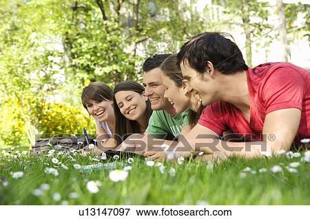 Stock Photo - Students studying outdoors. Fotosearch