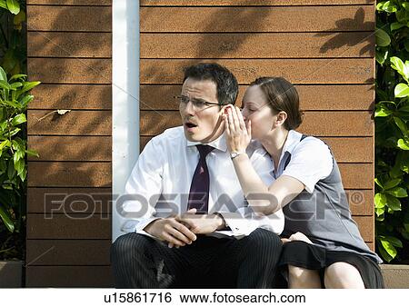 Surprised man hears office gossip View Large Photo Image Stock Photograph - Surprised man hears office gossip. Fotosearch