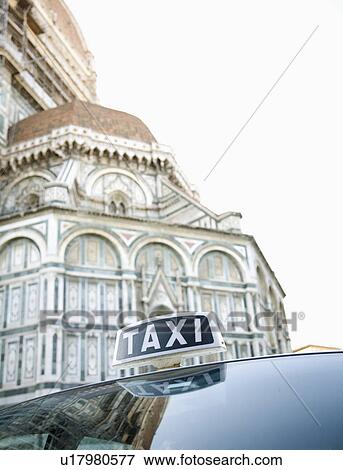Stock Photo - Taxi outside the Duomo, Florence, Italy. Fotosearch