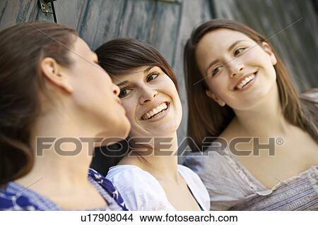 Three girls hanging out View Large Photo Image Picture - Three girls hanging out. Fotosearch